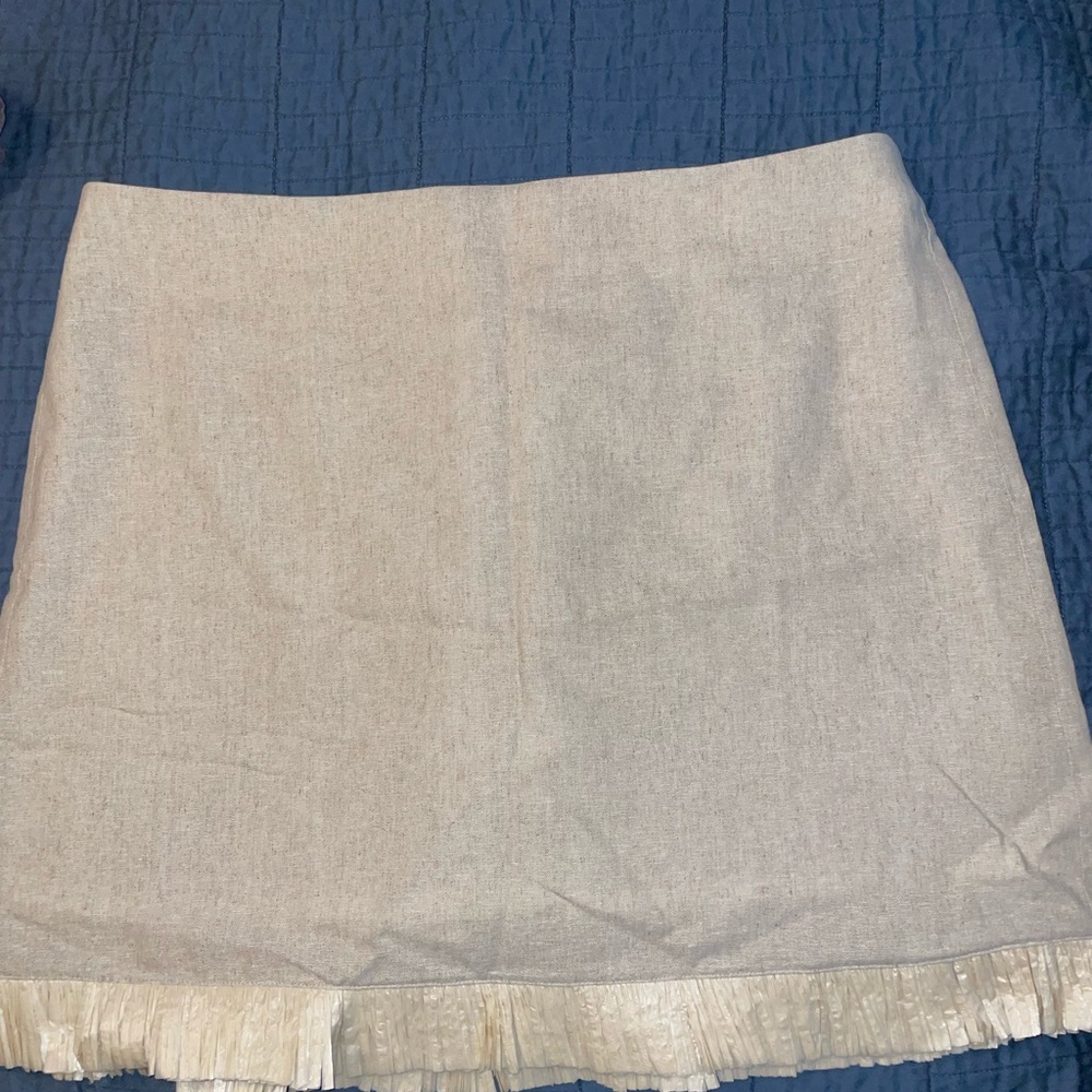 Elegant Cream Mini Skirt with Fringe Hem